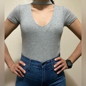 "Beautiful gray blouse, buttons from the bottom up!
